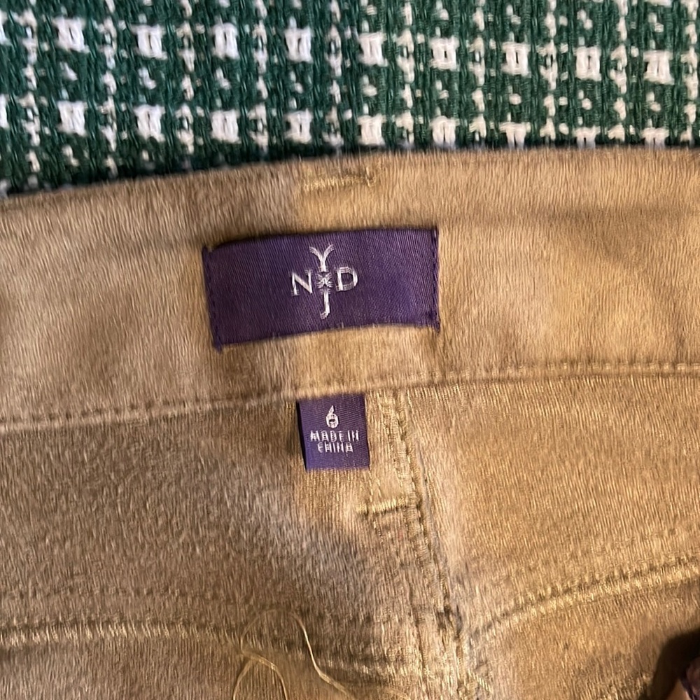 NYDJ five pocket boot cut.. Flattering tan color with a sueded finish